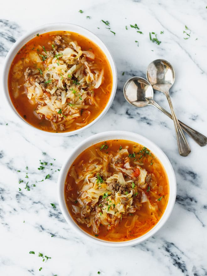 Cabbage soup recipe in white bowls