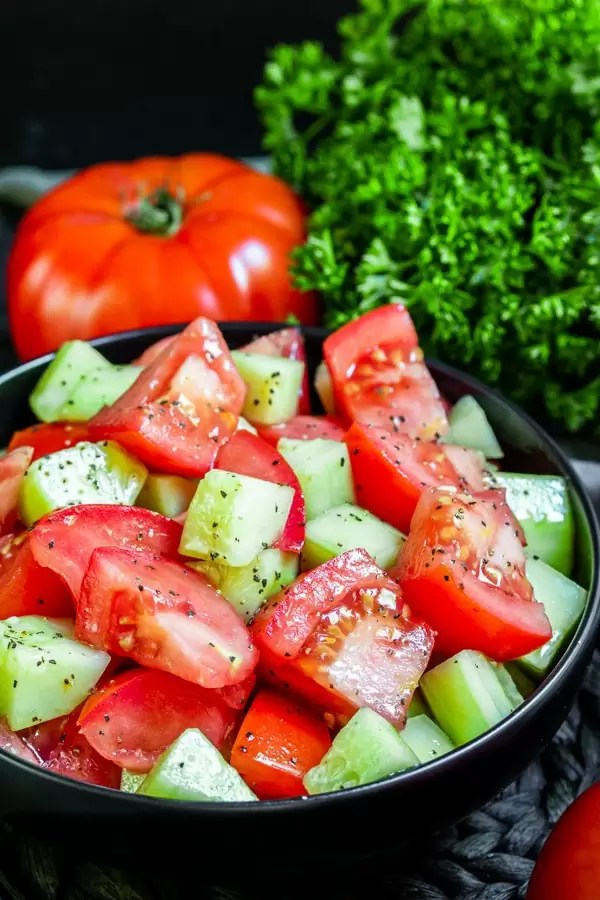 Cucumber and Tomato Salad is an easy side dish perfect for summer partys