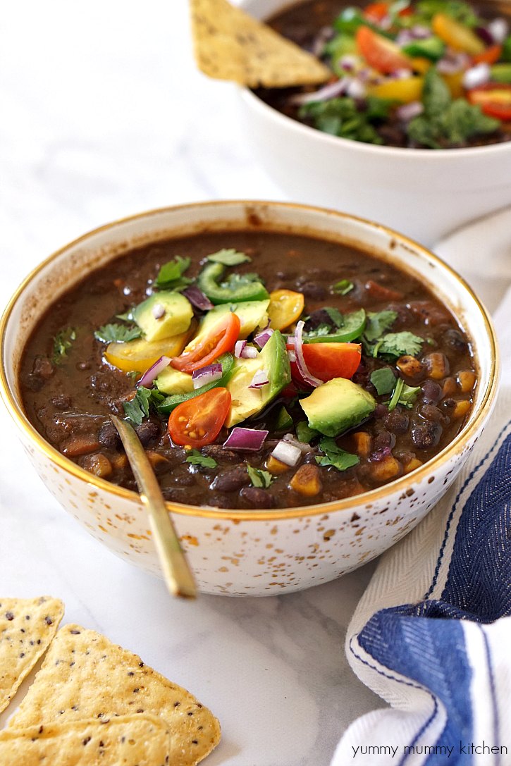 This vegetarian and vegan black bean soup is made in the slow cooker crockpot! It