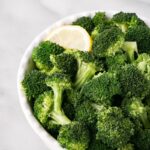 How to steam Broccoli with cooked broccoli in a white bowl