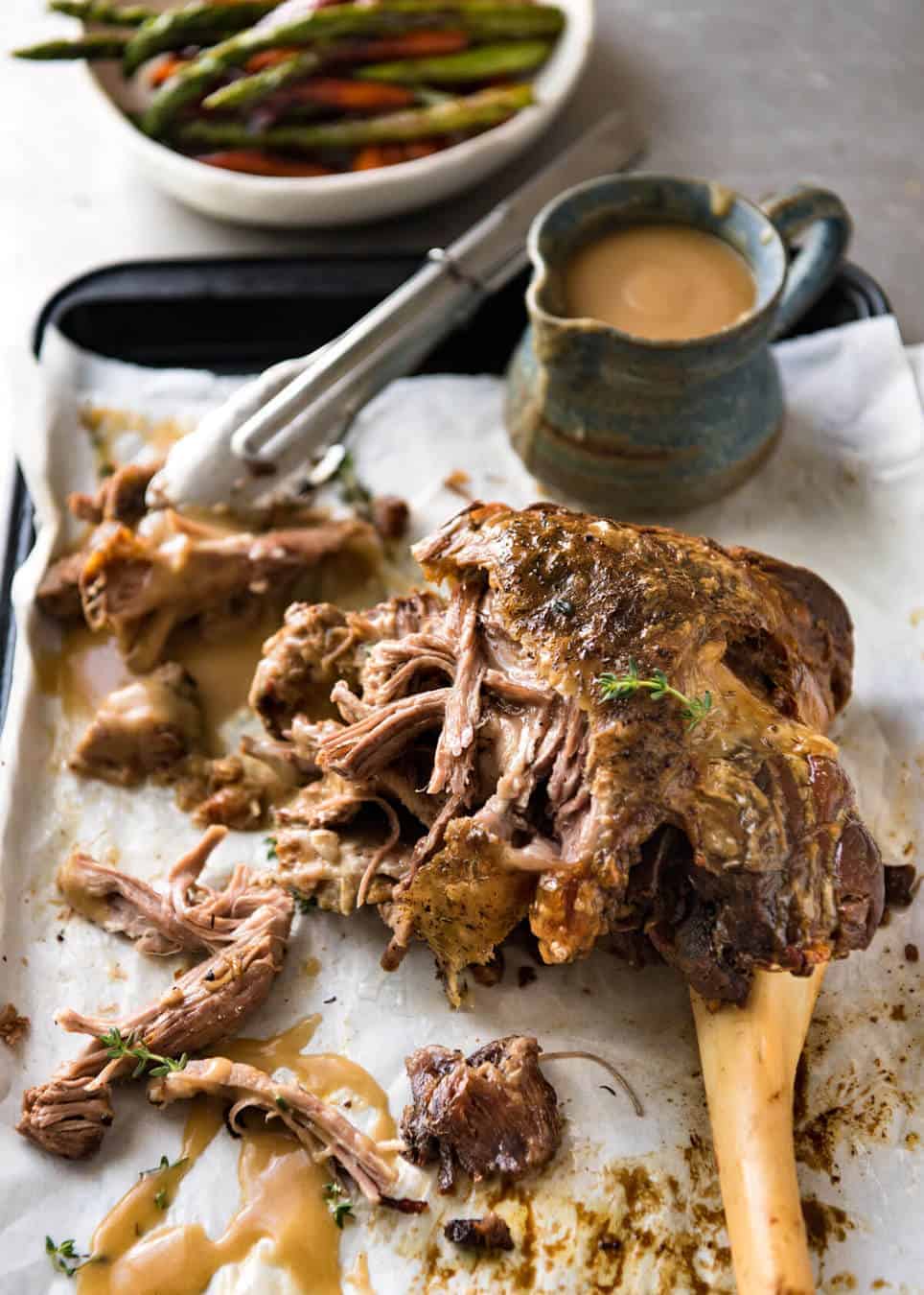 The most succulent and easiest lamb leg ever, this Slow Cooker Roast Lamb Leg takes minutes to prepare. The gravy is incredible! recipetineats.com