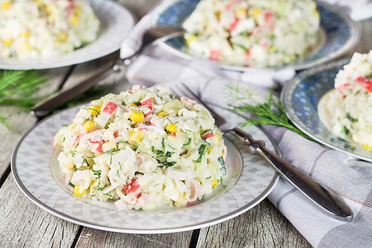 Check out this Russian version of the Imitation Crab Salad. Featuring corn, rice, eggs, and cucumber, it